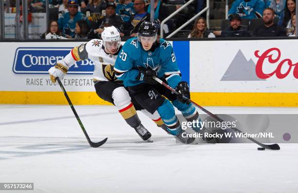 Marcus Sorensen of the San Jose Sharks skates with the puck against Reilly Smith of the Vegas Golden Knights in Game Six of the Western Conference...