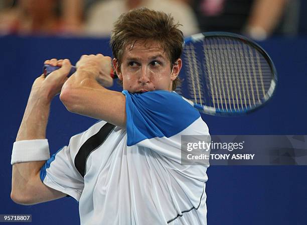 Igor Andreev of Russia returns against Andy Murray of Britain during their singles match on the tenth session, day seven of the Hopman Cup in Perth...