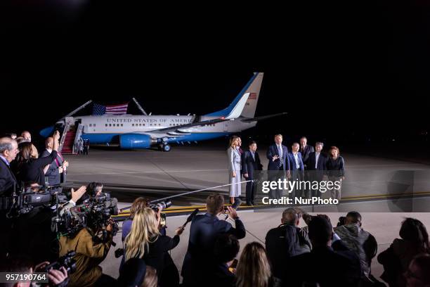 President Donald Trump speaks to reporters, surrounded by : First Lady Melania Trump, U.S. VP Mike Pence, his wife Karen Pence, American citizens...