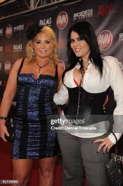Flower Tucci and Olivia O'Lovely arrives at the 2010 AVN Awards at the Pearl at The Palms Casino Resort on January 9, 2010 in Las Vegas, Nevada.