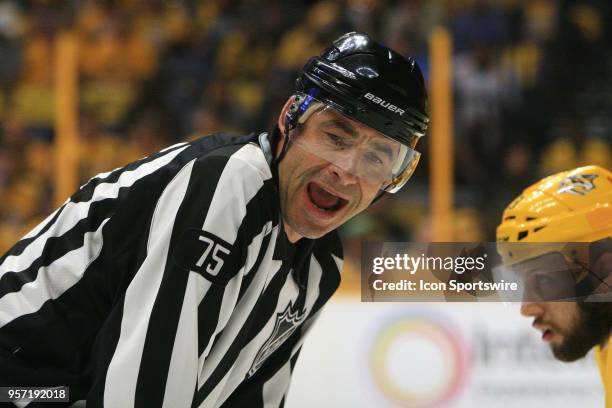 Linesman Derek Amell is shown during Game Seven of Round Two of the Stanley Cup Playoffs between the Nashville Predators and Winnipeg Jets, held on...