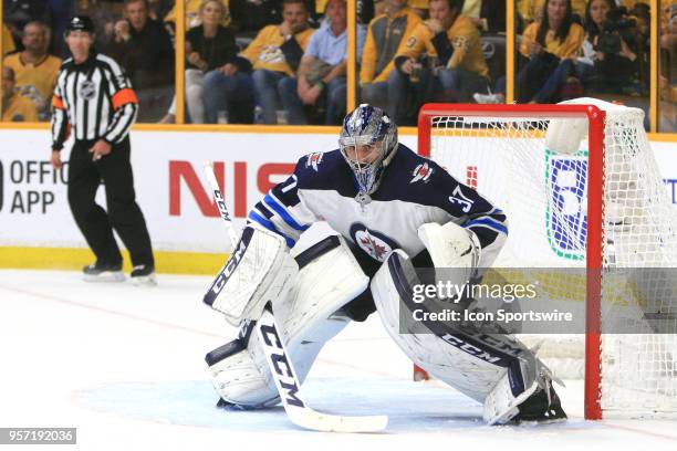 Winnipeg Jets goalie Connor Hellebuyck is shown during Game Seven of Round Two of the Stanley Cup Playoffs between the Nashville Predators and...