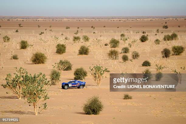 French Jean Louis Schlesser drives his buggy during the 9th stage Tabenkrout - Tenadi, Mauritania, of the second edition of the Africa Eco Race, on...