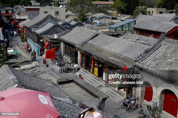 Die Altstadtgebiete im Zentrum von Peking sind für die Einheimischen und die Gäste beliebte Ziele für Spaziergänge. In den vielen Hutong leben...