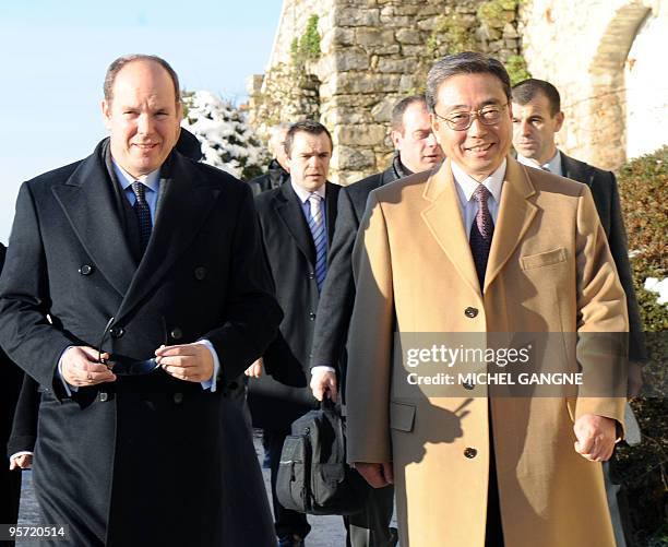 Prince Albert II of Monaco , general director of International Thermonuclear Experimental Reactor and Japanese Kanama Ikeda visit the construction...