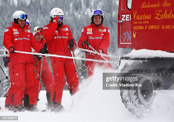 Felipe Massa of Brazil, Fernando Alonso of Spain and Giancarlo Fisichella of Italy and Ferrari are seen skiing during the Wroom 2010 on January 12,...