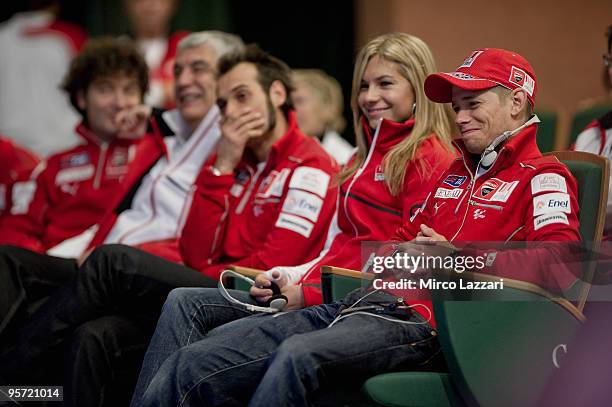 Casey Stoner of Australia and his wife Adriana Stoner look on and smile during the press conference during the 2010 Wrooom Ducati and Ferrari...