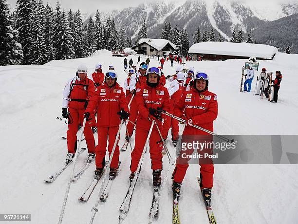 Felipe Massa of Brazil, Fernando Alonso of Spain and Giancarlo Fisichella of Italy and Ferrari are seen skiing during the Wroom 2010 on January 12,...