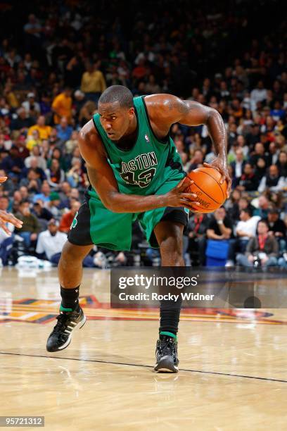 Kendrick Perkins of the Boston Celtics moves the ball to the basket during the game against the Golden State Warriors on December 28, 2009 at Oracle...