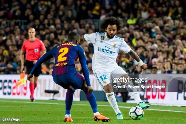 Marcelo Vieira Da Silva of Real Madrid fights for the ball with Nelson Cabral Semedo of FC Barcelona during the La Liga match between Barcelona and...