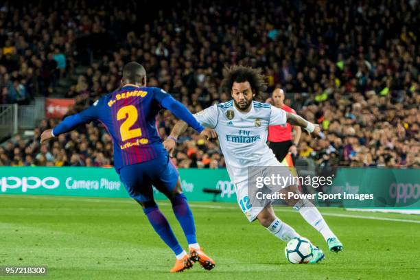 Marcelo Vieira Da Silva of Real Madrid vies for the ball with Nelson Cabral Semedo of FC Barcelona during the La Liga match between Barcelona and...