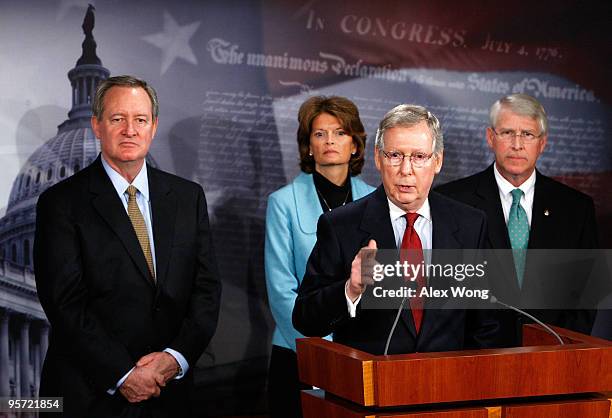 Senate Minority Leader Sen. Mitch McConnell speaks as Sen. Mike Crapo , Sen. Lisa Murkowski , and Sen. Roger Wicker listen during a news conference...