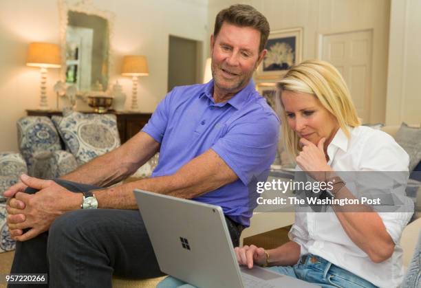 Baseball great Jim Palmer and his wife Susan, who did the genealogical research on her husband by computer, pose for this photograph in their Palm...