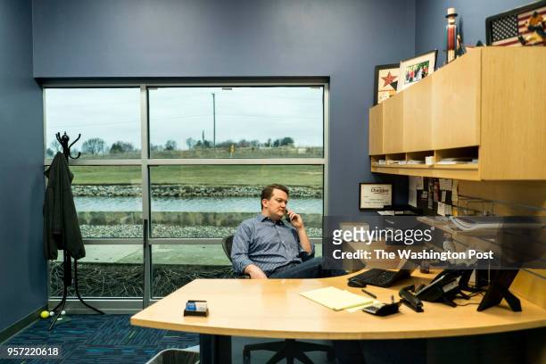 Andrew Chesney, businessman and politician in Stephenson County, works in his office at Seaga Manufacturing in Freeport, Illinois on Friday April 13,...