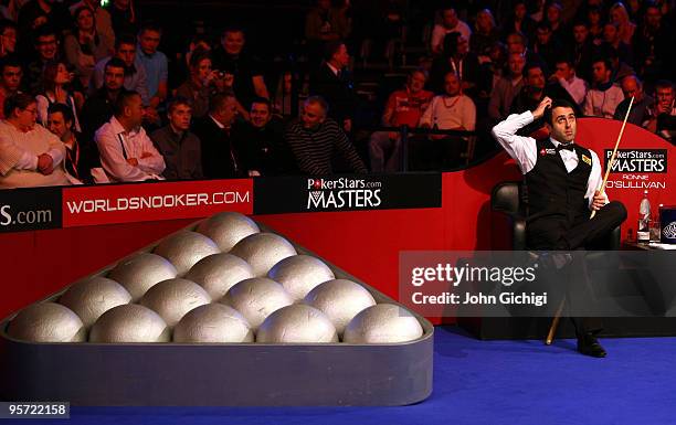 Ronnie O'Sullivan of England relaxes between frames in his second round match against Neil Robertson of Australia during the PokerStars.com Masters...