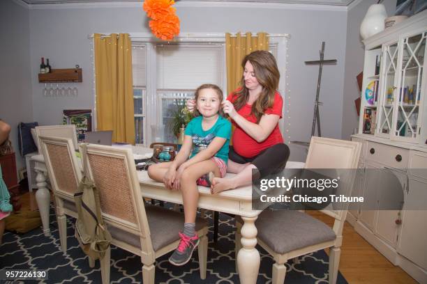 Ryan Tova Katz says it's not atypical to sit on the kitchen table with her stepdaughter, Aveline. Katz has been in Aveline's life since she was 2;...