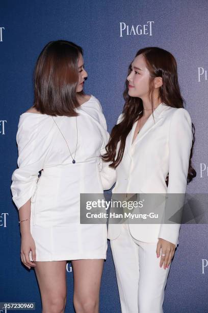 Krystal of girl group f and Former member of Girl's Generation Jessica Jung arrive at the photocall for PIAGET on May 10, 2018 in Seoul, South Korea.