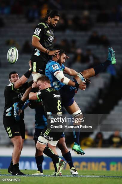 Michael Fatialofa of the Hurricanes pulls Patrick Tuipulotu of the Blues down in the lineout during the round 12 Super Rugby match between the Blues...