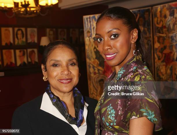 Phylicia Rashad and daughter Condola Rashad pose as Condola Rashad recieves her caricature for her role in the MTC play "St. Joan" at Sardis on May...