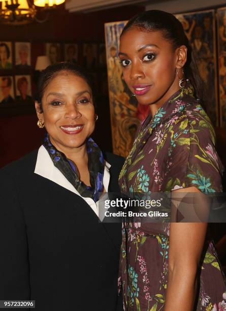 Phylicia Rashad and daughter Condola Rashad pose as Condola Rashad recieves her caricature for her role in the MTC play "St. Joan" at Sardis on May...
