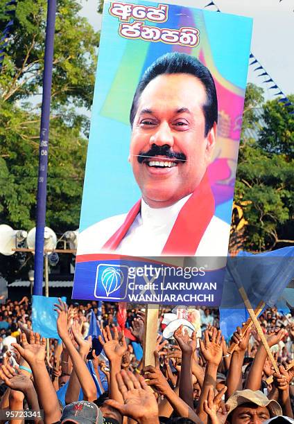 Supporters of Sri Lanka's President Mahinda Rajapakse attend an election rally in the southern coastal town of Ambalangoda on January 12, 2010....