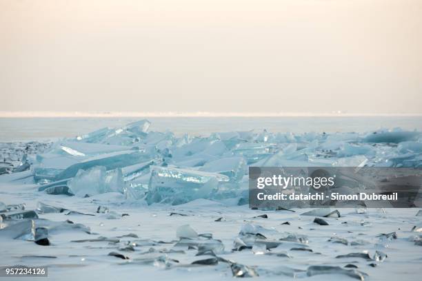 ice shards of lake baikal in winter - broken ice stock pictures, royalty-free photos & images