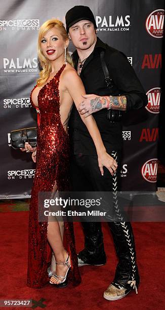 Adult film actress Angie Savage and singer Andy LaPlegua of the band Icon of Coil arrive at the 27th annual Adult Video News Awards Show at the Palms...