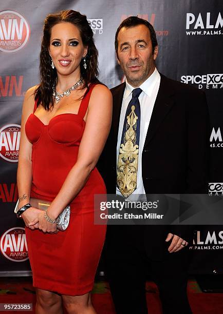 Adult film actress Kelly Divine and adult film producer/director John Stagliano arrive at the 27th annual Adult Video News Awards Show at the Palms...