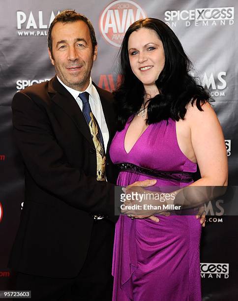 Adult film producer/director John Stagliano and his wife, Evil Empire Director and Executive Karen Stagliano, arrive at the 27th annual Adult Video...