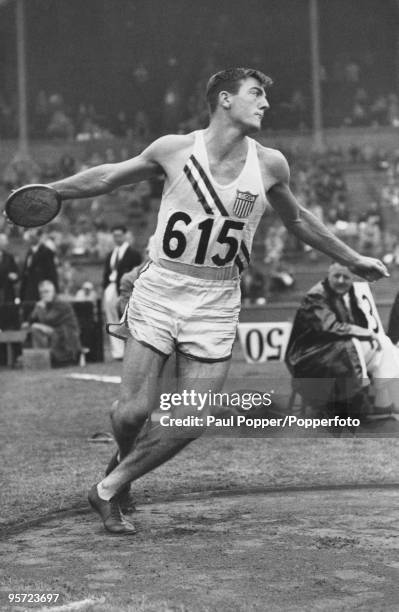 American decathlete Robert Bruce Mathias throws the discus during the Summer Olympics at Wembley Stadium, London, 6th August 1948. He took the gold...