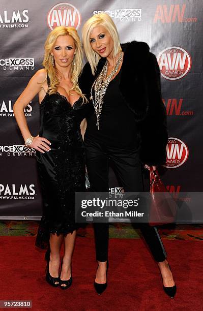 Adult film actresses Nikki Benz and Puma Swede arrive at the 27th annual Adult Video News Awards Show at the Palms Casino Resort January 9, 2010 in...