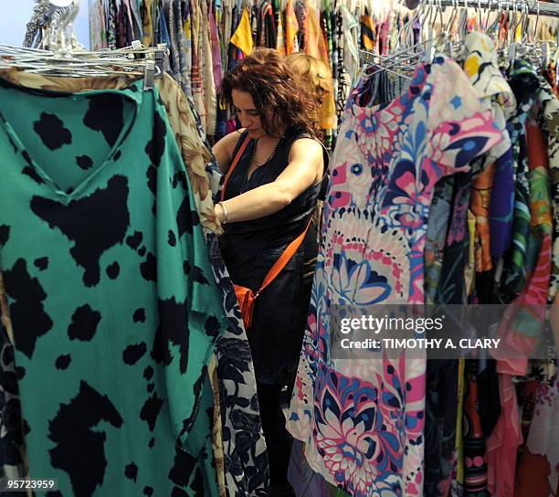 Member of the trade goes through fabric by Paradox Designs during the Direction by Indigo International Exhibition of Creative Textile Design on...