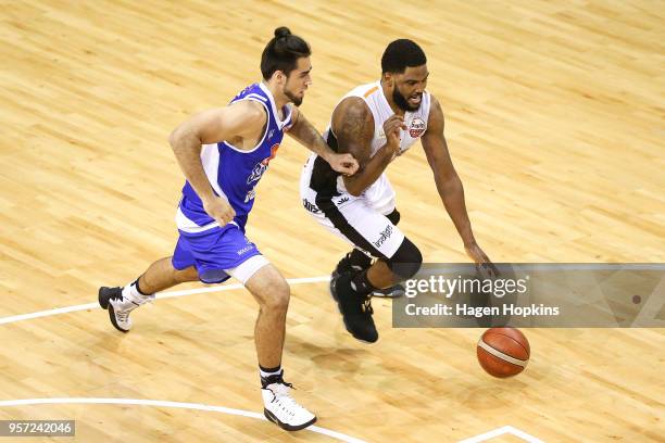 Shane Temara of the Saints defends against Jamie Skeen of the Hawks during the match between between the Wellington Saints and the Taylor Hawks at...