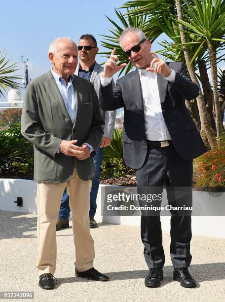 Author, director, producer, distributor and exhibitor Marin Karmitz and Cannes Film Festival Director Thierry Fremaux attend the photocall tribute To...