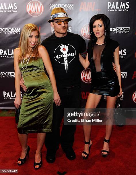 Adult film actress Hillary Scott, adult film director/actor Rob Rotten and Lucy Fox arrive at the 27th annual Adult Video News Awards Show at the...