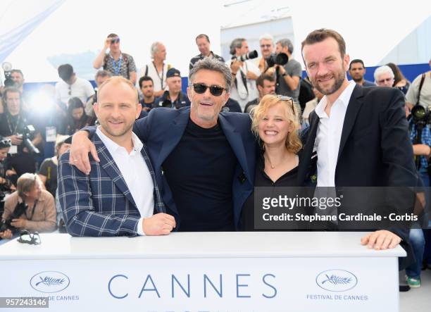 Actor Borys Szyc, director Pawel Pawlikowski, actress Joanna Kulig and actor Tomasz Kot attend the photocall for "Cold War " during the 71st annual...
