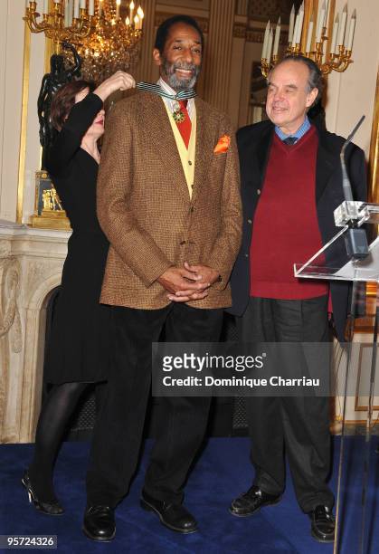 Ron Carter poses with the Minister of Culture and Communication Frederic Mitterrand as he received the French Order of Arts and Literature Award at...