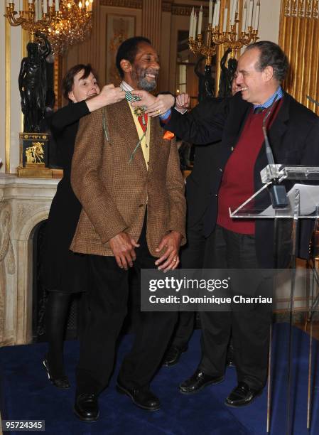 Ron Carter poses with the Minister of Culture and Communication Frederic Mitterrand as he received the French Order of Arts and Literature Award at...