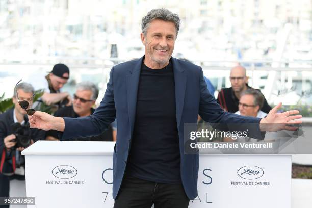 Director Pawel Pawlikowski wears a foot brace as he attends the photocall for "Cold War " during the 71st annual Cannes Film Festival at Palais des...