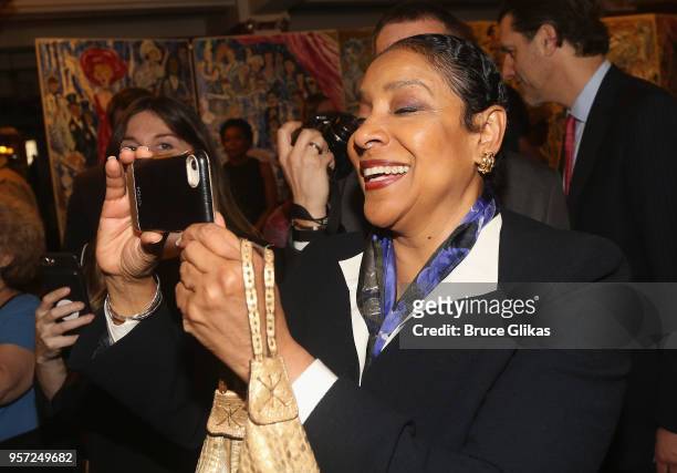 Phylicia Rashad attends as Condola Rashad recieves her caricature for her role in the MTC play "St. Joan" at Sardis on May 10, 2018 in New York City.