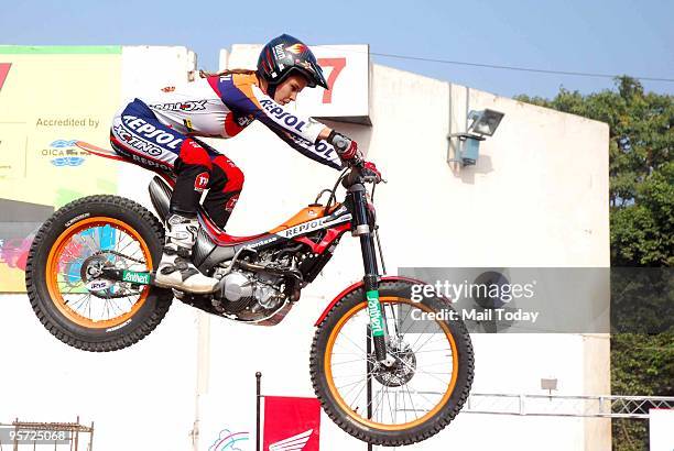 Professional bike rider shows some stunts at the 10th Auto Expo in New Delhi on Sunday, January 10, 2010. A motor company's attempt to promote its...