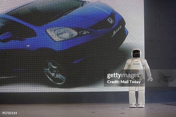 Asimo Robot talks about the newly launched small concept car of Honda at the 10th Auto expo in New Delhi on Thursday, January 7, 2010.