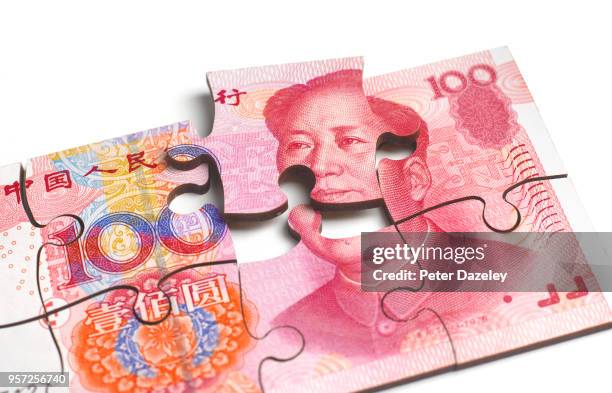 chinese yuan note breaking apart - cny stock pictures, royalty-free photos & images