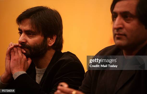 Chief Yasin Malik and Sajjad Lone at India-Pak peace conference in New Delhi on Sunday, January 10, 2010.