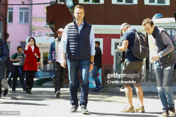 Russian opposition leader Alexei Navalny, leaves from a court hearing in Moscow, Russia on May 11, 2018 .