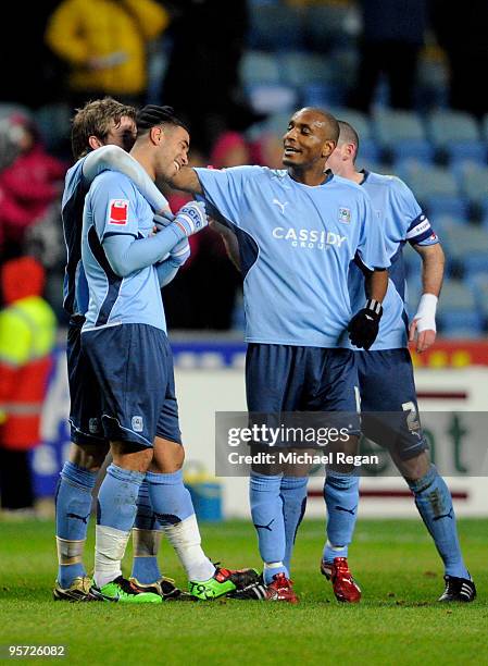 Leon Best of Coventry is congratulated by teammates after scoring the opening goal during the FA Cup sponsored by E.ON 3rd round replay match between...