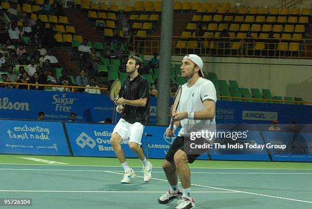 Marcel Granollers and Santiago Ventura of Spain in action against Janko Tipsarevic of Serbia and Yen-Hsun LU of Taipei.