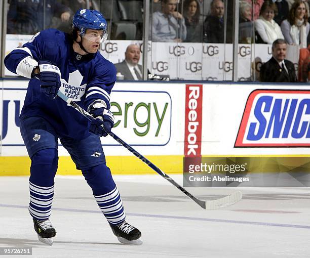 Garnet Exelby of the Toronto Maple Leafs moves the puck during game action against the Pittsburgh Penguins January 9, 2010 at the Air Canada Centre...
