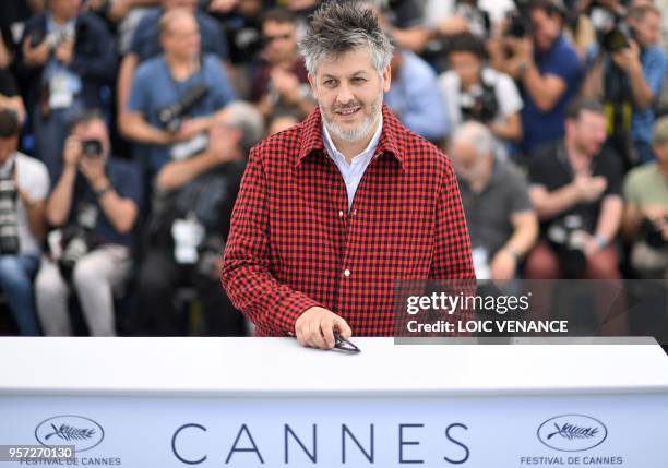 French director Christophe Honore poses on May 11, 2018 during a photocall for the film "Sorry Angel " at the 71st edition of the Cannes Film...