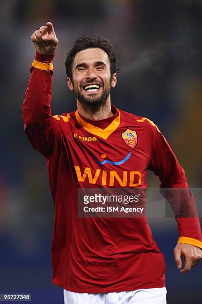 Mirko Vucinic of AS Roma celebrates after scoring his team's second goal during the Tim Cup between AS Roma and Triestina Calcio at the Olimpico...